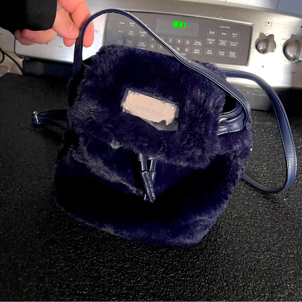 Limited edition Swarovski blue faux fur mini backpack bag